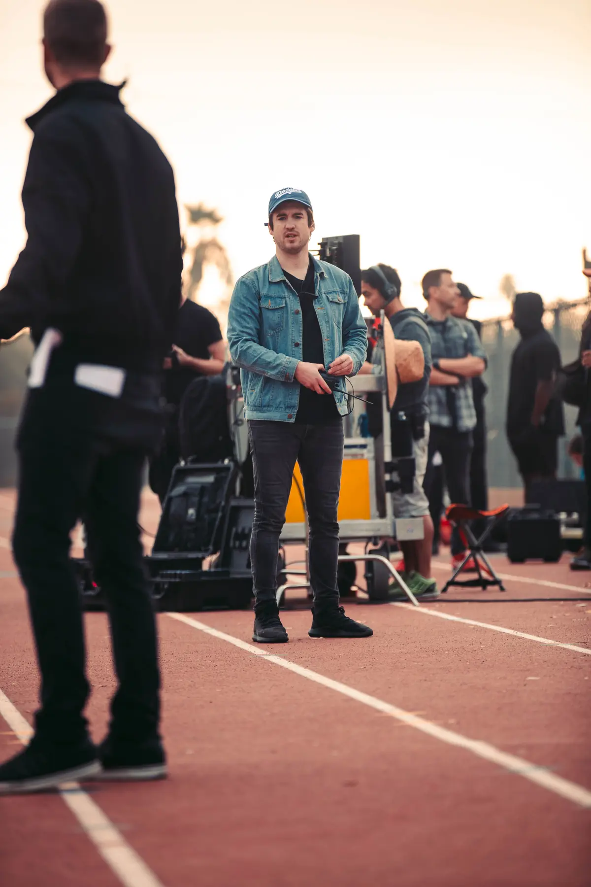 Crew lined along the track watching a take