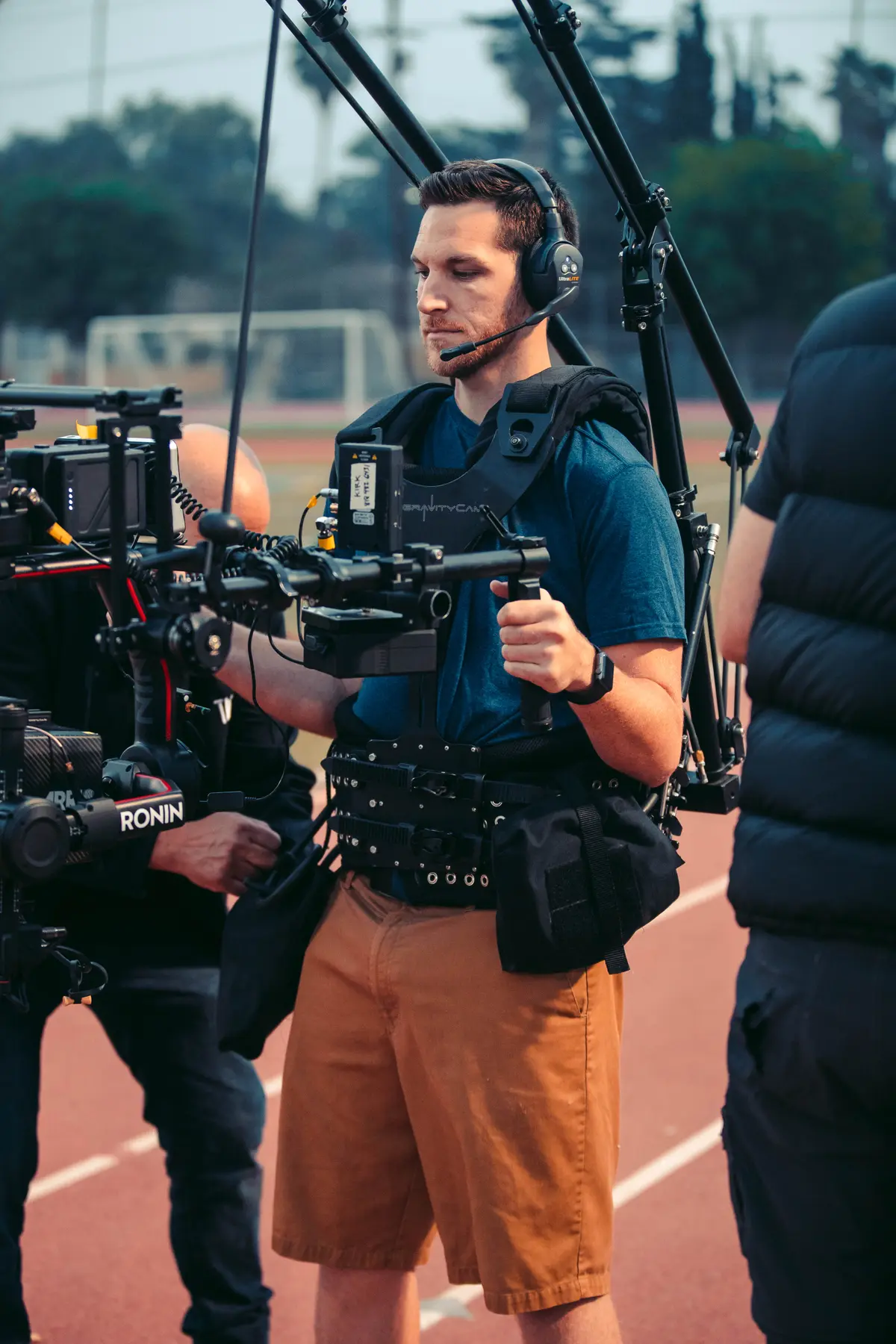 Operator running a Ronin rig on the sideline